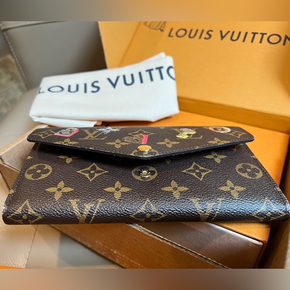 Louis vuitton limited edition Monogram love Lock full size Sarah Wallet - Picture 5 of 11